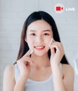 Live video streaming of beauty asian woman teaching apply skincare treatment serum for health care