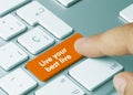 Live your best live - Inscription on Orange Keyboard Key