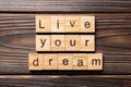 Live your dream word written on wood block. live your dream text on wooden table for your desing, concept Royalty Free Stock Photo