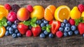 A lively collection of summer fruits and berries, displaying a charming array of colors and textures.