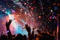 A lively crowd of people at a concert, cheering with confetti raining down on them, A burst of confetti rains down on the ecstatic Royalty Free Stock Photo