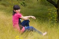 Lively girl with weeds Royalty Free Stock Photo