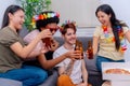 Joyful Birthday Celebration with Friends, Pizza, and Beers Royalty Free Stock Photo