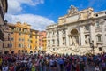 Crowded Piazza di Trevi and fountain view Rome Italy