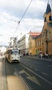 Lively street in downtown Sarajevo with a tram