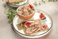 Liver meat pate spread with fig, breakfast on a light background top view. copy space Royalty Free Stock Photo