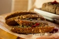 Liver pate spread on bread bran with berries on paper Royalty Free Stock Photo