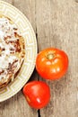 Liver pie with tomatoes above view Royalty Free Stock Photo