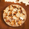 Liver on a wooden plate. cow skin on table