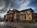 Liverpool Christmas atmosphere, street decorations and beautiful colorful buildings and buildings, blue sky, railway station