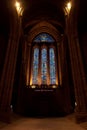LIVERPOOL, ENGLAND, DECEMBER 27, 2018: Huge entrance stained glass between darkness and light, from interior of the Church of