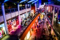 LIVERPOOL, ENGLAND, DECEMBER 27, 2018: People shopping at Chavasse Park outdoor mall, decorated with Christmas lights, balls and Royalty Free Stock Photo