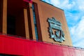 Liverpool, England, United Kingdom; 10/15/2018: Badge or emblem of Liverpool FC in the facade of the building of Anfield Stadium Royalty Free Stock Photo