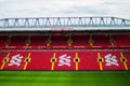 Liverpool, England, United Kingdom; 10/15/2018: Empty red steps or terraces of Sir Kenny Dalglish Stand in Anfield, Liverpool`s F