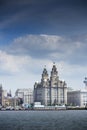 Liverpool, June 2014,  a scene across the River Mersey showing Pier Head, with the Royal Liver Building, Cunard Building and Port Royalty Free Stock Photo