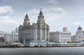 Liverpool, June 2014,  a scene across the River Mersey showing Pier Head, with the Royal Liver Building, Cunard Building and Port Royalty Free Stock Photo