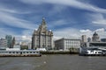 Liverpool, June 2014,  a scene across the River Mersey showing Pier Head, with the Royal Liver Building, Cunard Building and Port Royalty Free Stock Photo