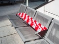 Liverpool Street Station, the main train concourse with red & white taped seats to prevent passenger use. Royalty Free Stock Photo