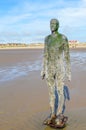 Liverpool, UK - 03 April 2015 - Another Place sculpture of Antony Gormley on Crosby Beach.