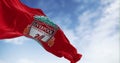 Liverpool Football Club flag waving on a clear day