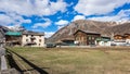 Livigno village, street view with old wooden houses, Italy, Alps Royalty Free Stock Photo