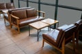 Living area in coffee shop or restaurant. Close up Comfort Chair with Wooden Table