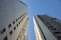 Living building exterior high tower shape modern common architecture object foreshortening from below on blue sky background view Royalty Free Stock Photo