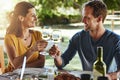 Living and loving. a happy married couple enjoying lunch together outside. Royalty Free Stock Photo