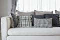 Living room with black and white checked pattern pillows Royalty Free Stock Photo