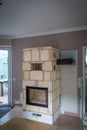 In a living room is built a tiled stove Royalty Free Stock Photo