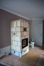 In a living room is built a tiled stove Royalty Free Stock Photo