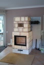 In a living room is built a tiled stove Royalty Free Stock Photo