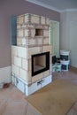 In a living room is built a tiled stove Royalty Free Stock Photo