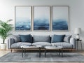 Living room with couch, tables, and paintings comfortable and cozy atmosphere Royalty Free Stock Photo