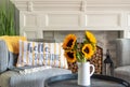 Living room decor with an accent pillow that says hello sunshine