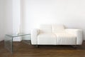 Living room detail with a white leather sofa Royalty Free Stock Photo