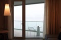 Living room with glass door to balcony. Sea view