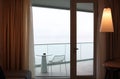 Living room with glass door to balcony. Sea view