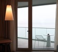 Living room with glass door to balcony. Sea view