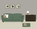 Living room with a green sofa. Pictures with tropical plants in the interior Royalty Free Stock Photo