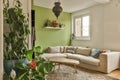 a living room with green walls and a white couch Royalty Free Stock Photo