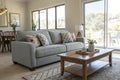 Living room with grey sofa and large window Royalty Free Stock Photo
