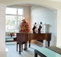 Living room with holiday decorations during bright daylight Royalty Free Stock Photo