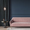 Living room interior in dark blue with a pink sofa and a gold