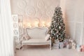 Living room interior with sofa decorated chic Christmas tree Royalty Free Stock Photo