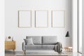 Living room interior with three poster, panoramic window and sofa Royalty Free Stock Photo