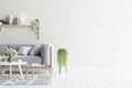 Living room interior wall mock up with grey velvet sofa and plants Royalty Free Stock Photo