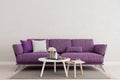 Living room interior wall mock up with purple violet sofa, empty white wall with free space above on top Royalty Free Stock Photo