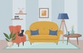 Living room interior with yellow sofa, floor lamp, painting, armchair, houseplant. A black kitten sits on a armchair. Living room. Royalty Free Stock Photo