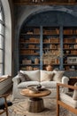 A living room with a large blue bookcase and a white couch Royalty Free Stock Photo